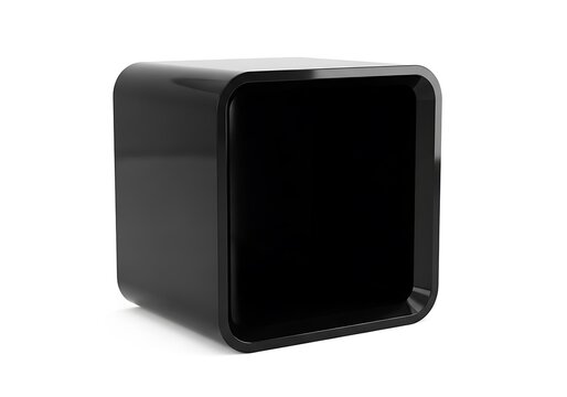 Modern minimalist black cube-shaped electronic device on white background