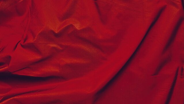 crimson silk fabric drape texture for luxury branding web design advertising background with elegant folds