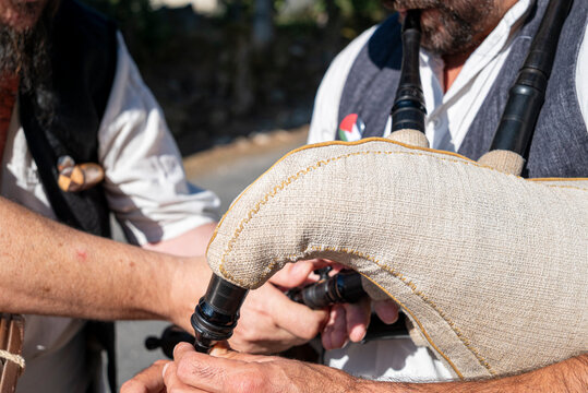Traditional bagpipes player performing at a folk festival The Concept of cultural heritage