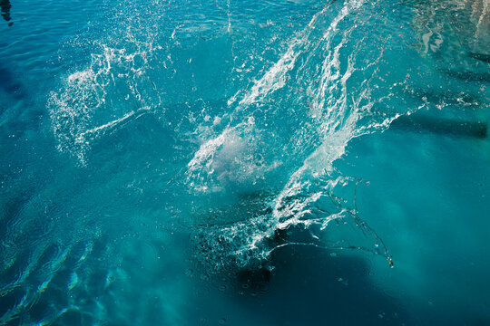 Water Splash in Outdoor Swimming Pool
