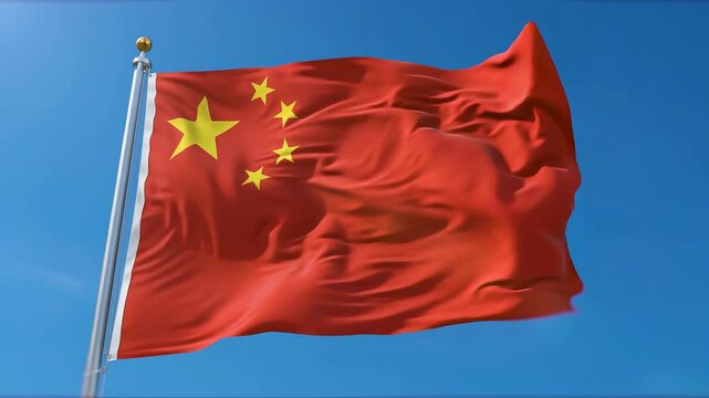 Red Chinese national flag with yellow star waving on tall flagpole against bright blue sky. China nation republic patriotism concept for government identity and proud culture celebration.