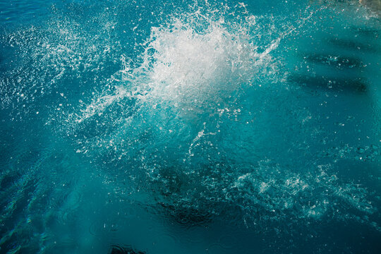 Water Splash in Outdoor Swimming Pool
