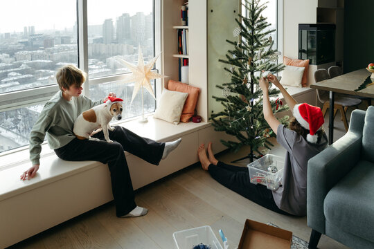 Joyful Moments of Holiday Decorating in a Cozy Modern Apartment