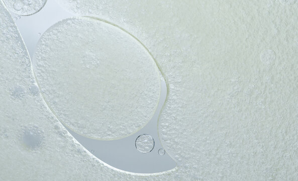 Abstract Blue water bubbles essential oil beauty collagen Serum Repair cell background.