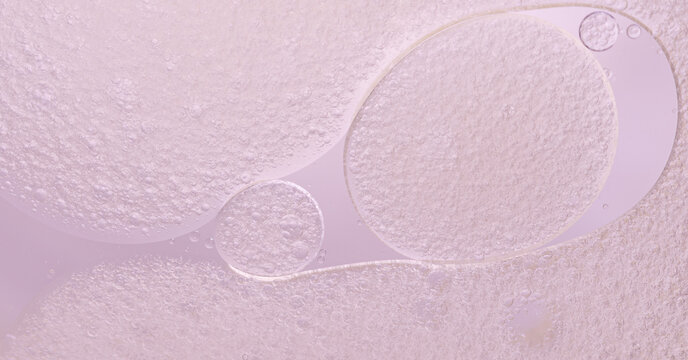 Abstract Pink water bubbles essential oil beauty collagen Serum Repair cell background.