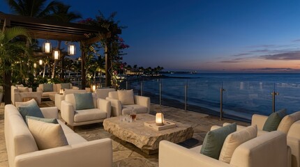 Fototapeta premium Luxury outdoor lounge area at a beach resort during sunset with comfortable seating and ambient lighting
