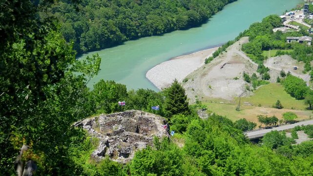ruins of Queen Tamar castle, showing valley of the Chorokhi River - picturesque mountainous landscape in the Adjara region of Georgia, with lush green forests covering the slopes of the Caucasus