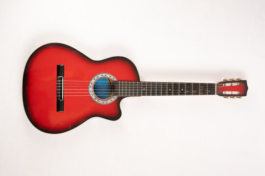 Red Sunburst Acoustic Guitar Isolated on White Background
