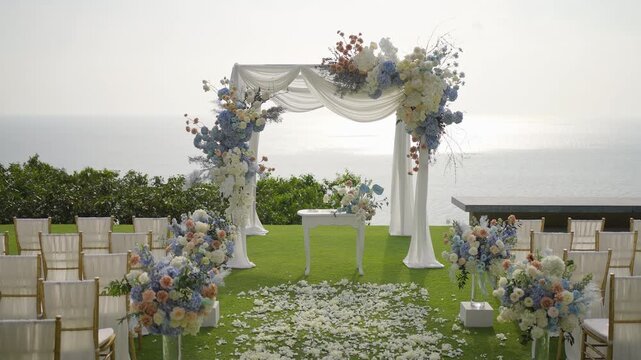 Wedding detail set up white flowers in a vase.