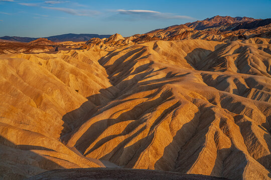 Beautiful wide scenic view of badlands sediment hills at Zabriskie Point in Death Valley