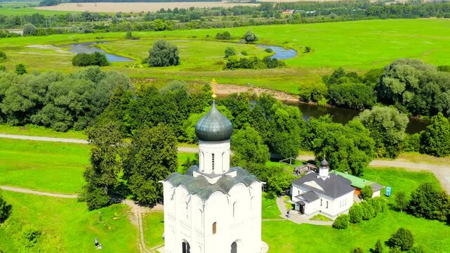 Russia, Bogolyubovo. Drone footage of Church of the Intercession on the Nerl. Orthodox church and a symbol of medieval Russia. Drone footage, Point of interest