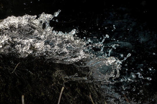 Waterfall splash macro. Water texture background. Fresh liquid motion. Frozen droplet spray. Cascading stream foam. High speed aqua shot. Dynamic wave action. Pure fluid splash. Crystal clear droplets