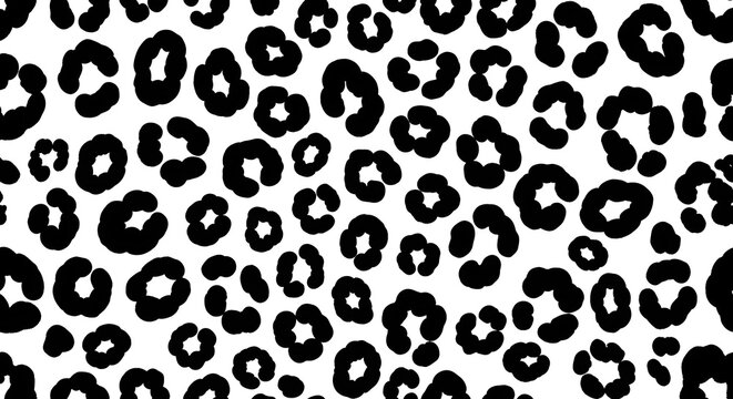 Seamless black and white leopard print pattern with a hand drawn aesthetic