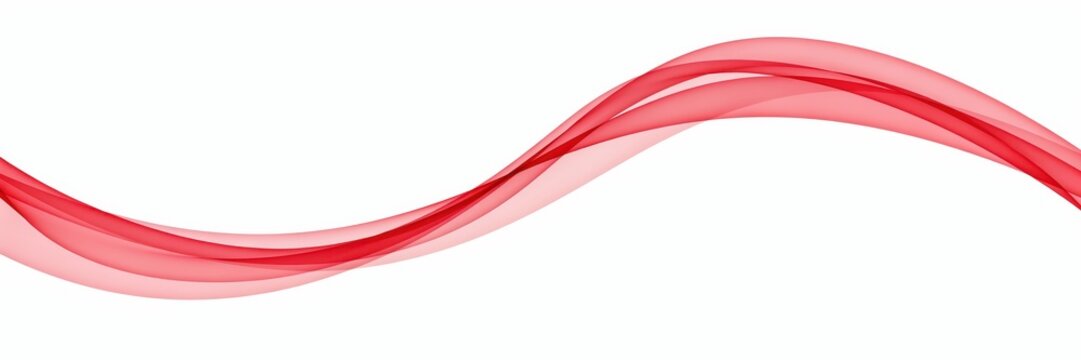 Swirling red ribbon on white, creating a beautiful wave for decorative purposes.