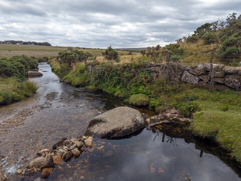 Small dam of rocks across a stream