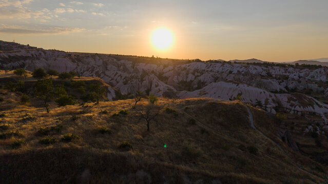 Sunset over U&ccedil;hisar castle in the background