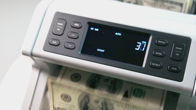 Automated Money Counting Machine Counting Hundred Dollar Bills Fast