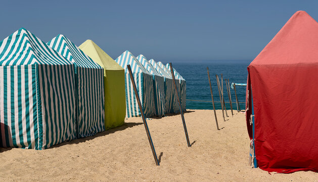 Awnings. Ovar (Portugal), August 8, 2026. Parasols on the beach of Ovar, a Portuguese tourist town located in the Aveiro district, with approximately 17,200 inhabitants. 
