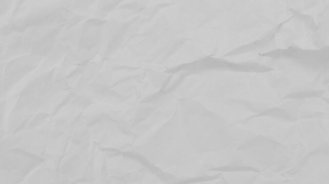 Crumpled paper unfolding reveal transition stop motion.  Wrinkled surface opening and closing animation with green background.
