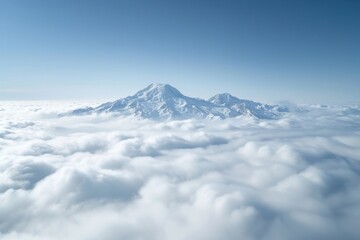 Fototapeta premium Photo of snowy mountain peek through cloud outdoors nature sky.