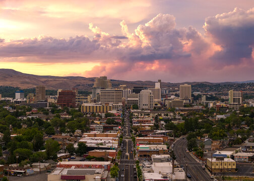 Reno Nevada - Aerial Photo of Downtown Reno and Midtown at Sunset with Smoke Plume from Bug Fire in Background