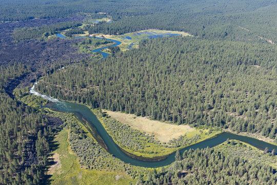 The scenic Deschutes River is a scenic 252-mile tributary of the Columbia River in Central Oregon. It flows through Bend and offers whitewater kayaking, rafting, paddle boarding, and great fishing.