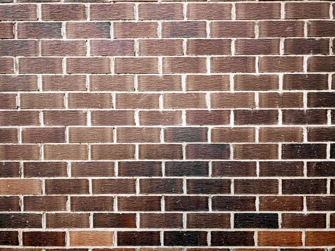 Stylish brutal modern brown brick wall texture. Background close-up.