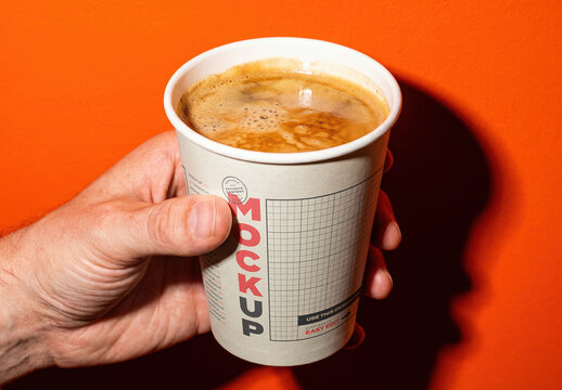 Hand Holding Coffee Cup Hard Flash Branding Mockup
