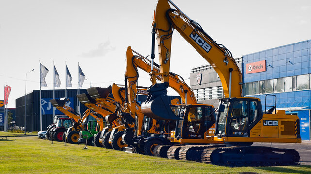 Riga, Latvia - July 30, 2026: Novrya JCB tracked construction equipment on the street near the auto center