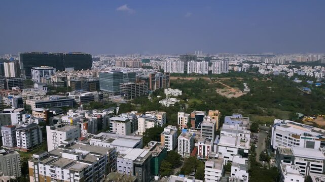 Aerial view of Hyderabad cityscape flying over buildings