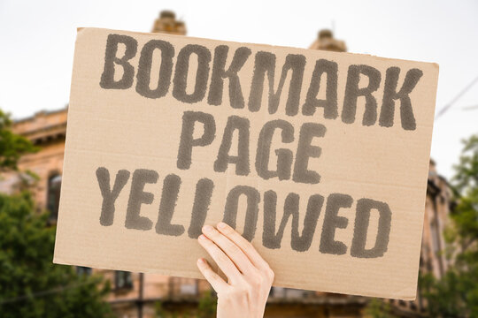 "Bookmark Page Yellowed" A stopped story waits for a reader's return.