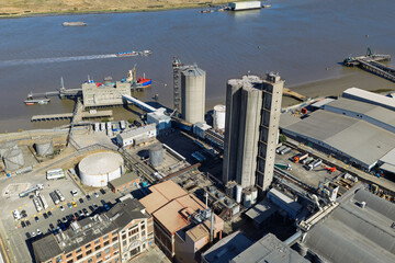 Busy Grain Silos and Shipping Terminal at the River Port © Tom
