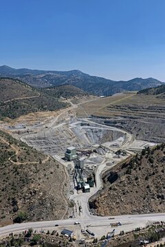 Aerial view of the Floyd Hill quarry and mining facility in the mountainous landscape of Colorado, featuring processing structures and access roads in Floyd Hill, Colorado, United States.