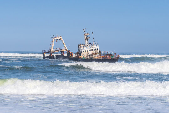 The Zeila Shipwreck on the Namibian skeleton coast in rough seas.