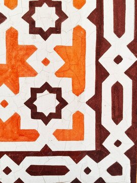 orange and brown morrocan geometric zellige pattern - islamic art texture 