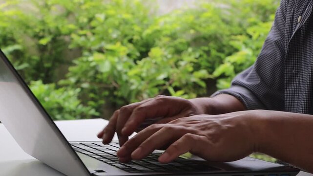 Man using laptop, smartphone, secure 2FA authentication concept with verification, password protection, cybersecurity technology. Safe digital login access for online accounts, privacy, data security.