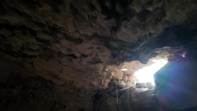 Malta, Xemxija Heritage trail, Punic caves interior, small opening and celling.