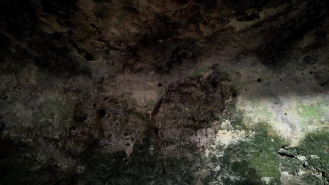 Malta, Xemxija Heritage trail, Punic caves interior, small opening and celling.