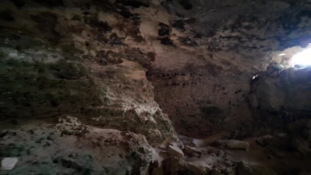 Malta, Xemxija Heritage trail, Punic caves interior, small opening and celling.