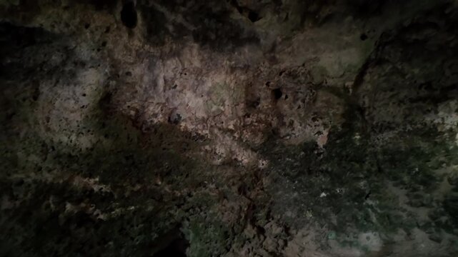 Malta, Xemxija Heritage trail, Punic caves interior. Holes in the walls used as shelfs and to tie animals.