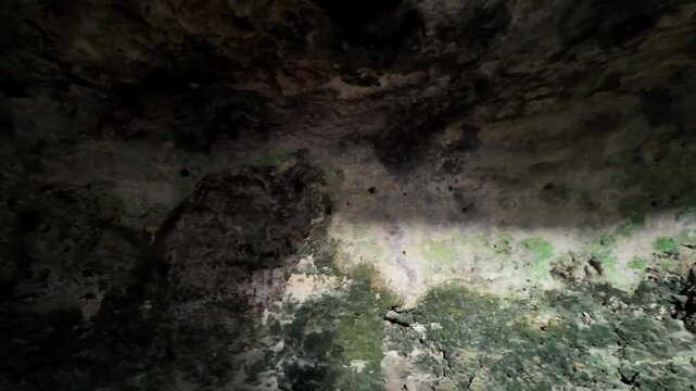 Malta, Xemxija Heritage trail, Punic caves interior, small opening and celling.
