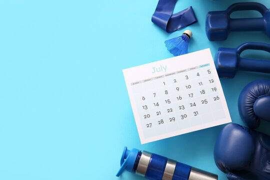 Composition with calendar and different sports equipment on color background