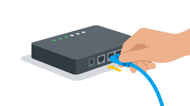 Hand connecting ethernet cable to network router