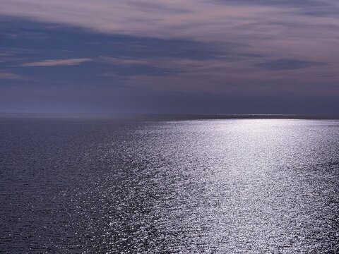 Shiny sea water and dusk sky