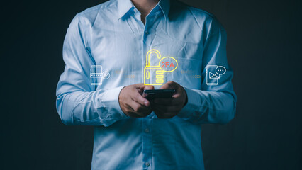 Businessman using smart phone with virtual two factor authentication graphic overlay. Concept of cyber security, secure login, personal data protection and privacy. © 418 House
