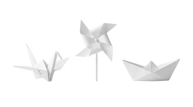 White paper origami crane pinwheel and boat isolated on white background isolated on transparent background