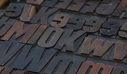 Vintage wooden letterpress type blocks typography printing press details © Graphics World