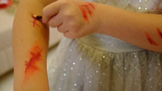 Girl with dramatic stage makeup and Halloween body paint. Theatrical styling suitable for holiday and performance themes. 
