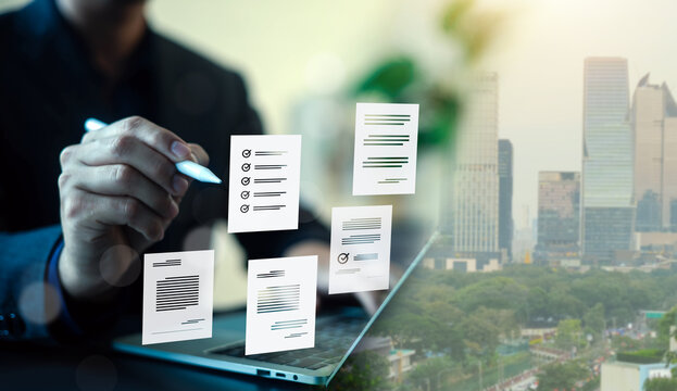 Business man using digital document management system for paperless office workflow. Concept of online document filing, checklist, and corporate e-signature with city background.