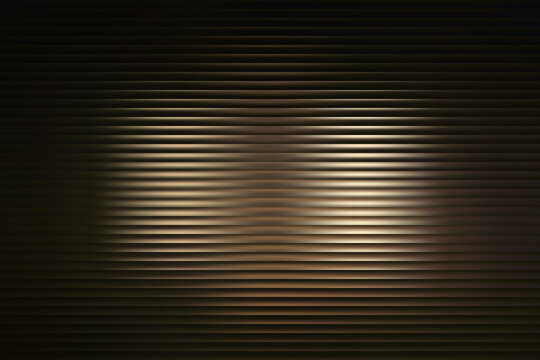 Dark abstract background with horizontal metallic lines and a soft glowing spotlight effect
